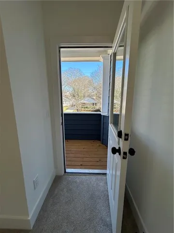 a view of balcony with furniture