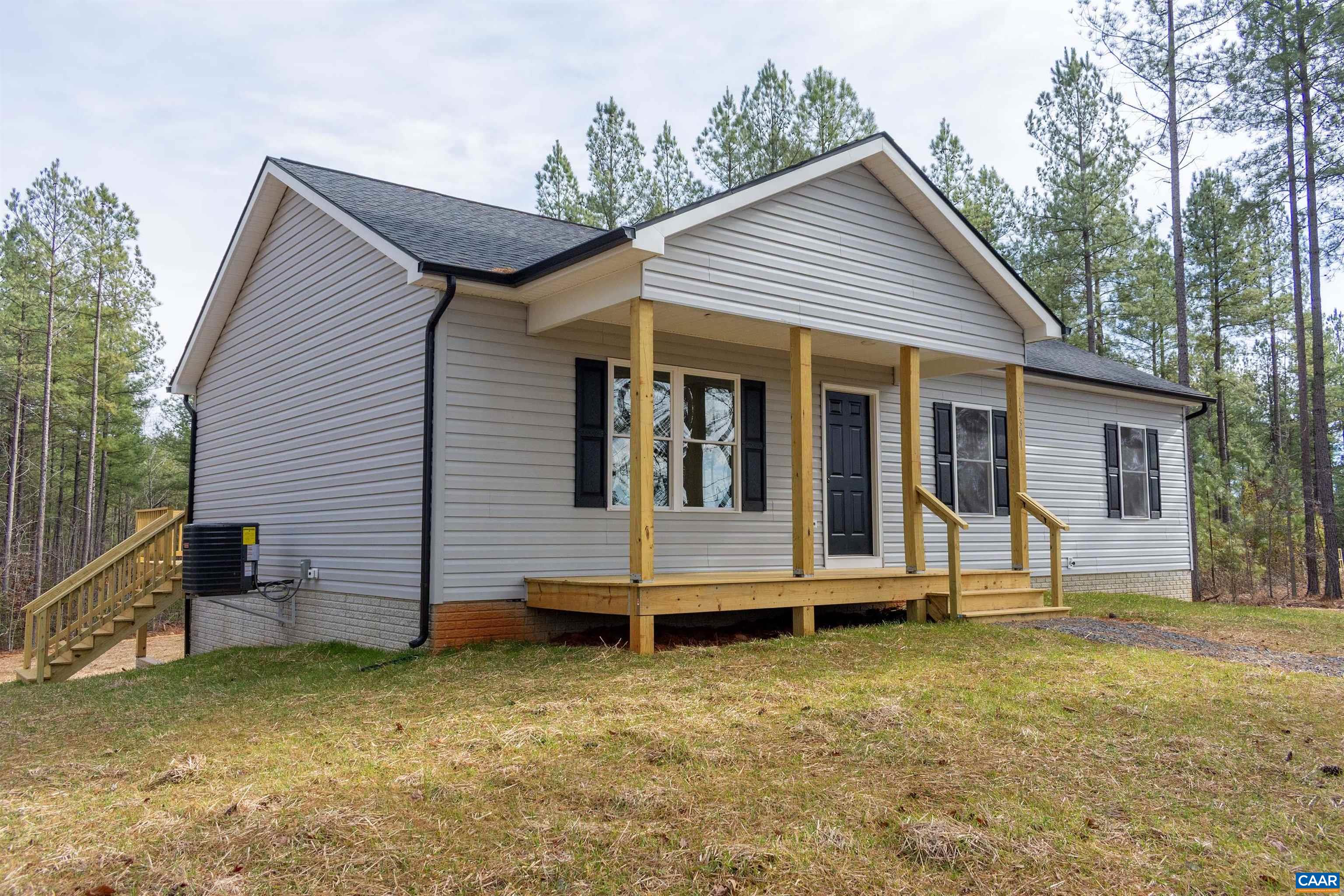 15301 Shirley Road Unionville, VA 22567 - Photo 1 of 27 a view of a house with a backyard and stairs