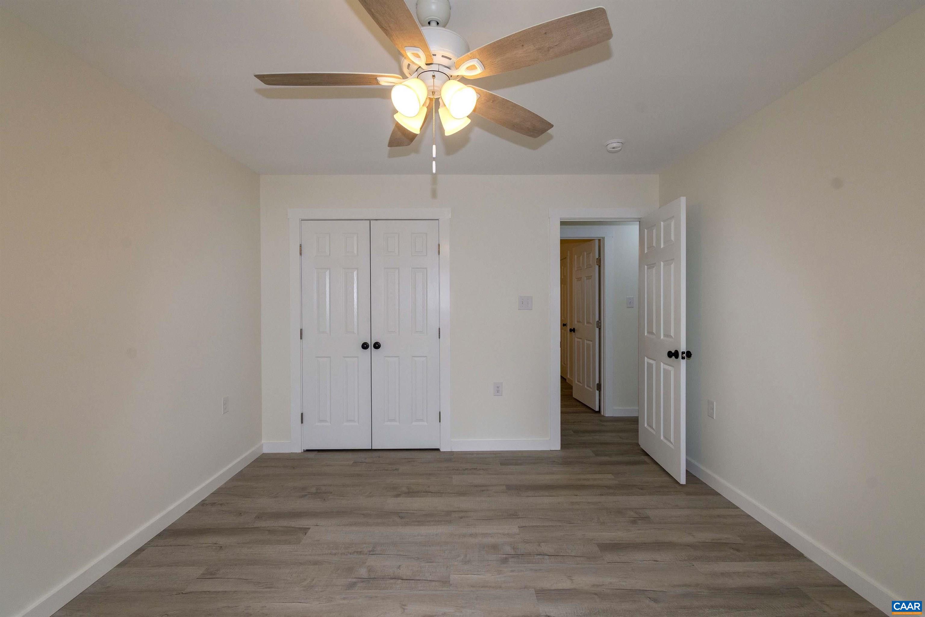 15301 Shirley Road Unionville, VA 22567 - Photo 11 of 27 a view of a livingroom with a fan