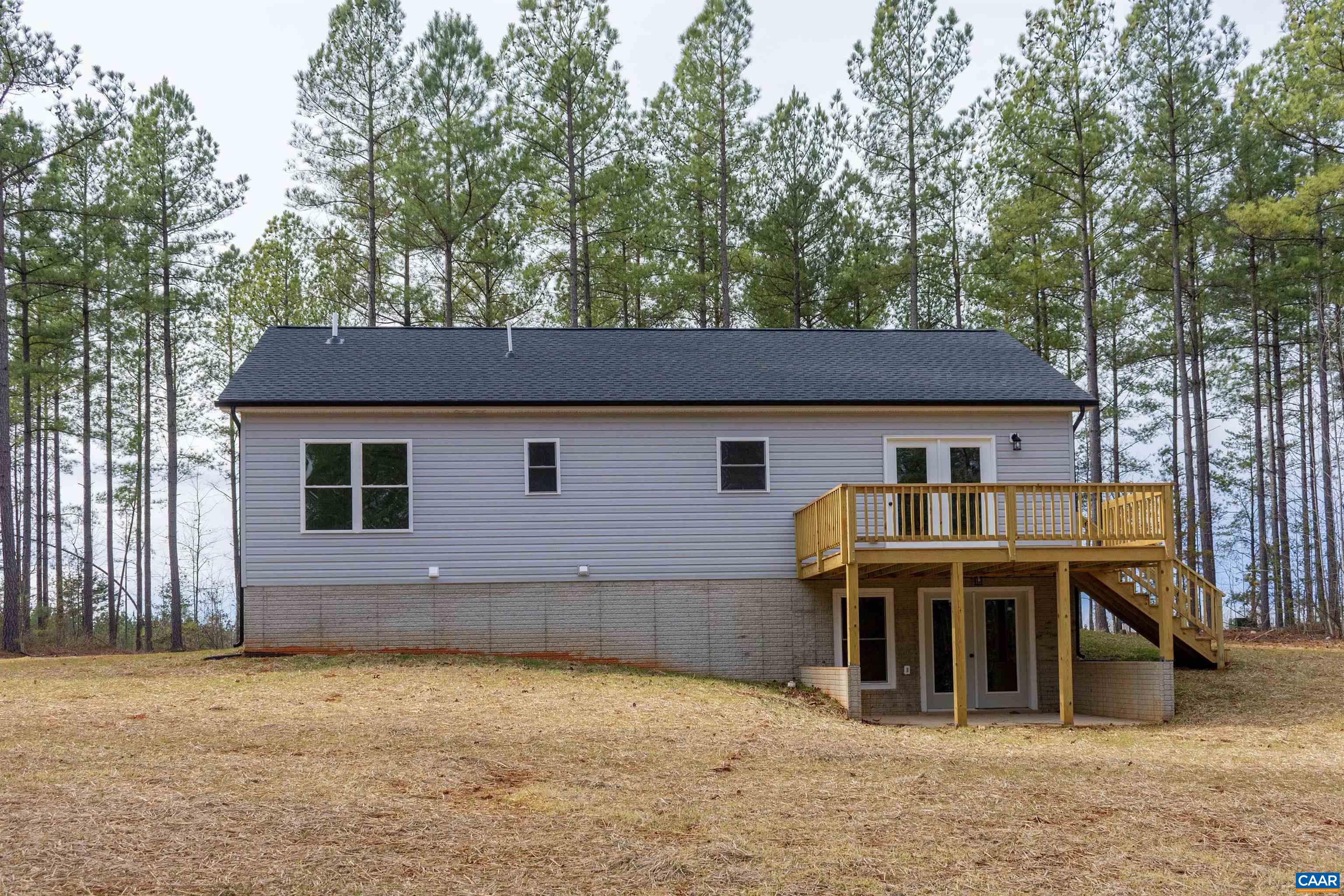 15301 Shirley Road Unionville, VA 22567 - Photo 22 of 27 a front view of a house with patio