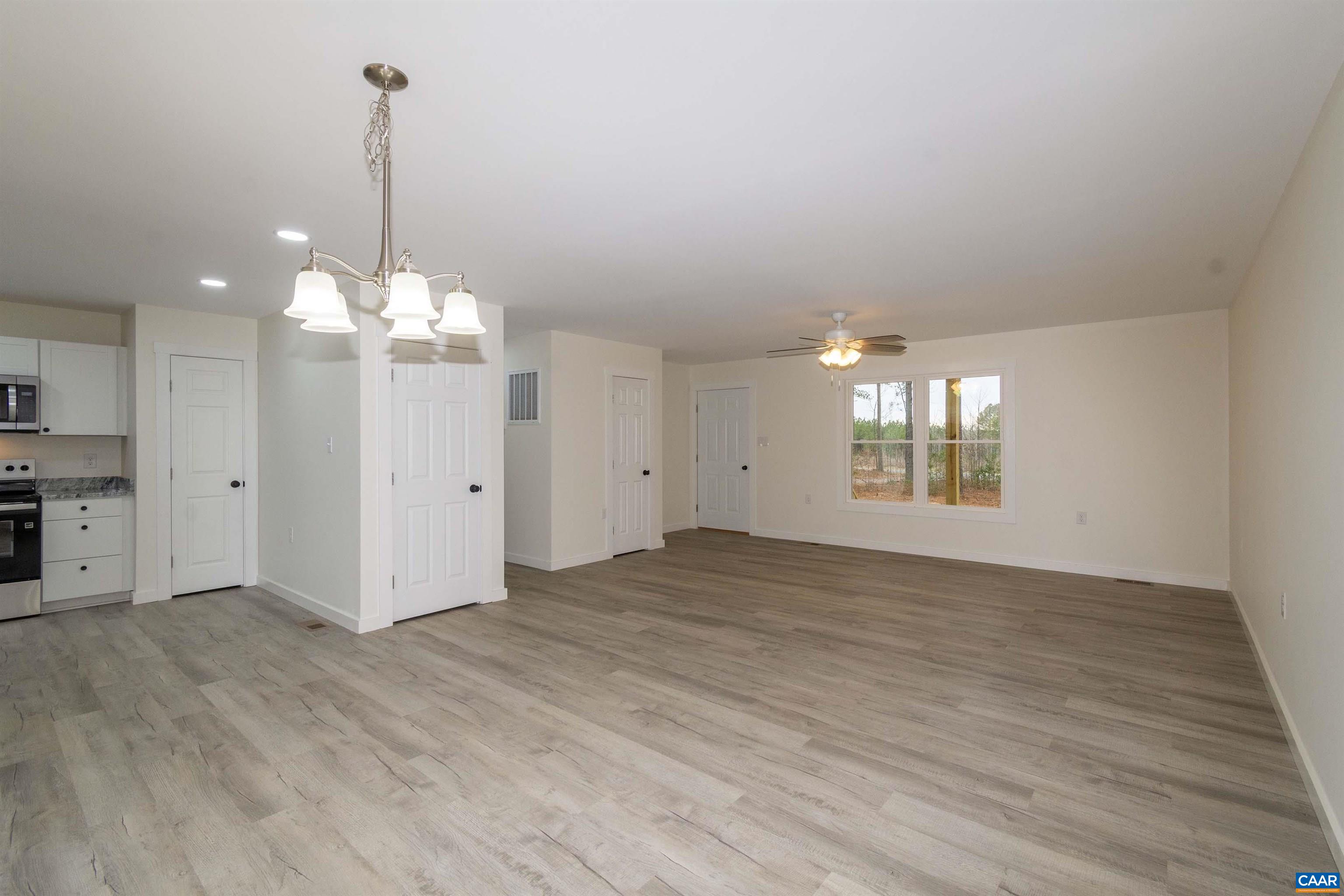 15301 Shirley Road Unionville, VA 22567 - Photo 9 of 27 a view of a room with window and wooden floor