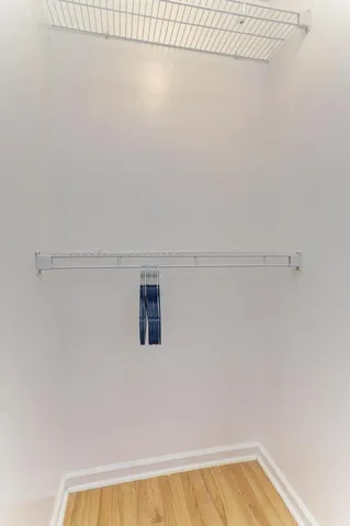 a view of a chair and table in the patio