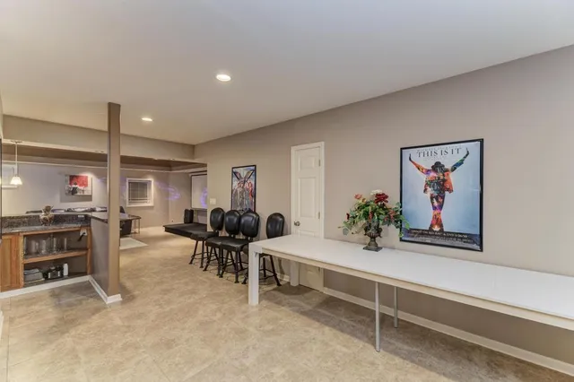 an aerial view of house with yard