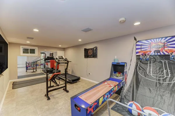 an aerial view of residential houses with outdoor space and street view