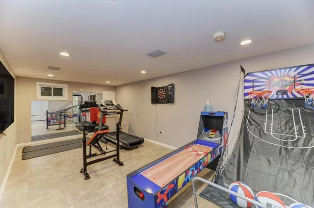 an aerial view of residential houses with outdoor space and street view