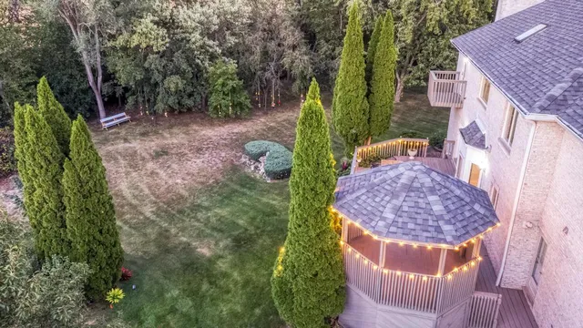 a wooden bench sitting in the middle of a forest