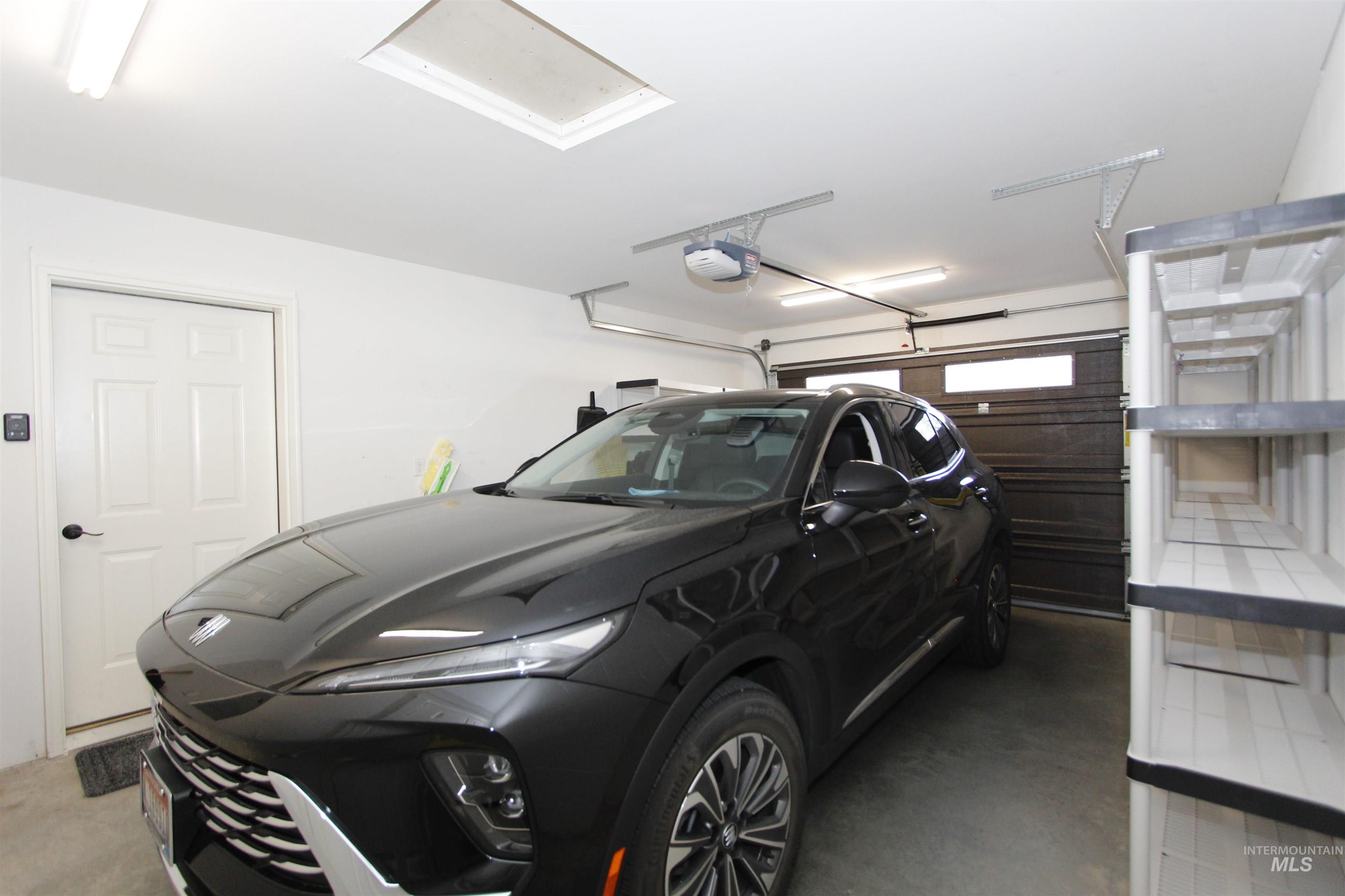 3434 5th Street, Unit B Lewiston, ID 83501 - Photo 10 of 14 Garage with a garage door opener