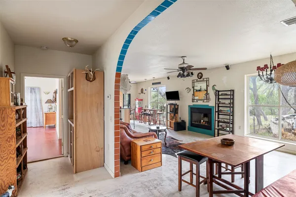 a view of a livingroom with furniture and window