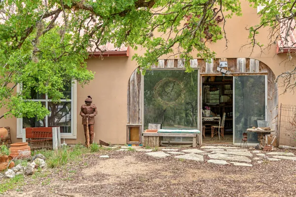 a house with a tree in front of it