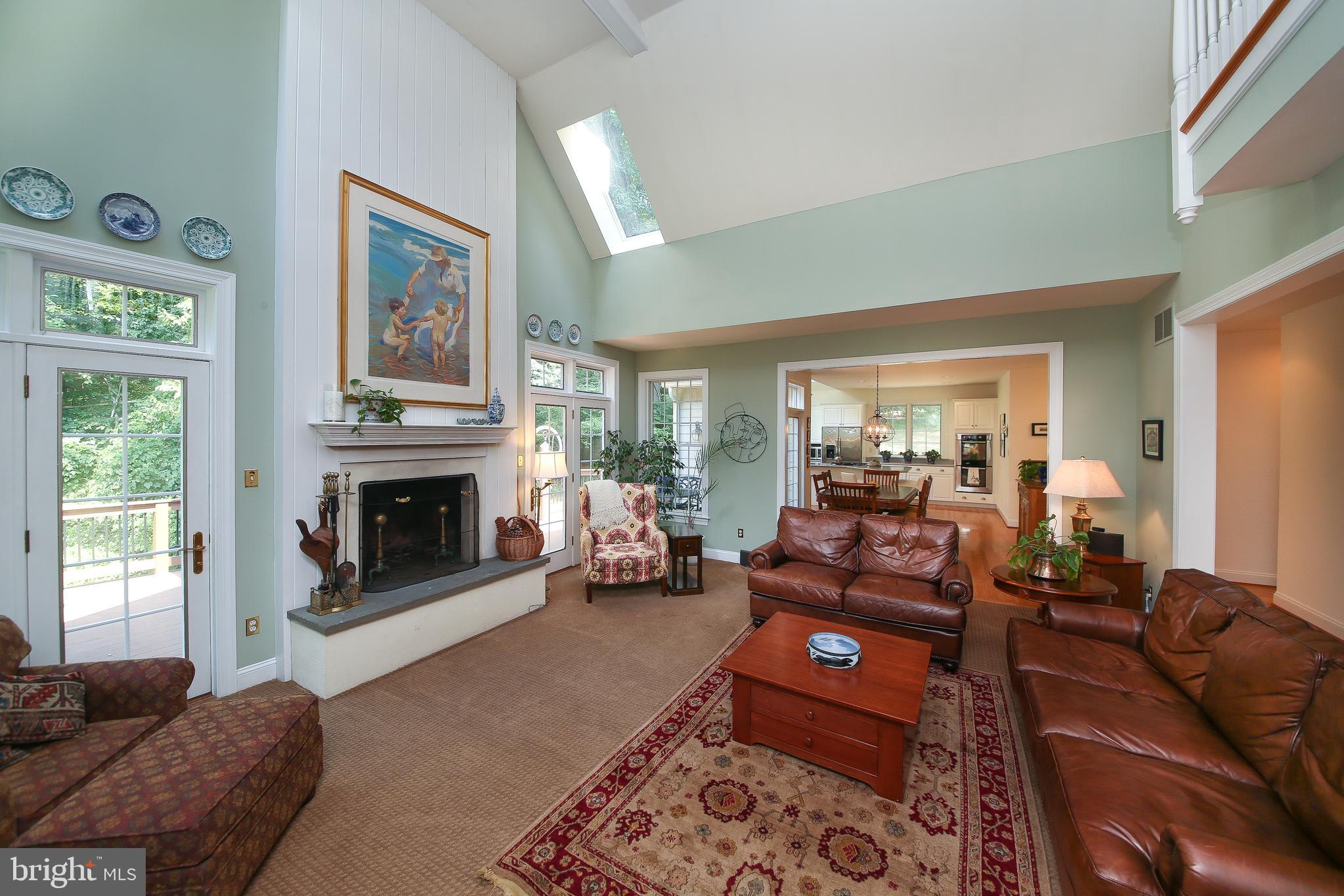 4 Paul Road Wayne, PA 19087 - Photo 12 of 46 a living room with furniture and a fireplace