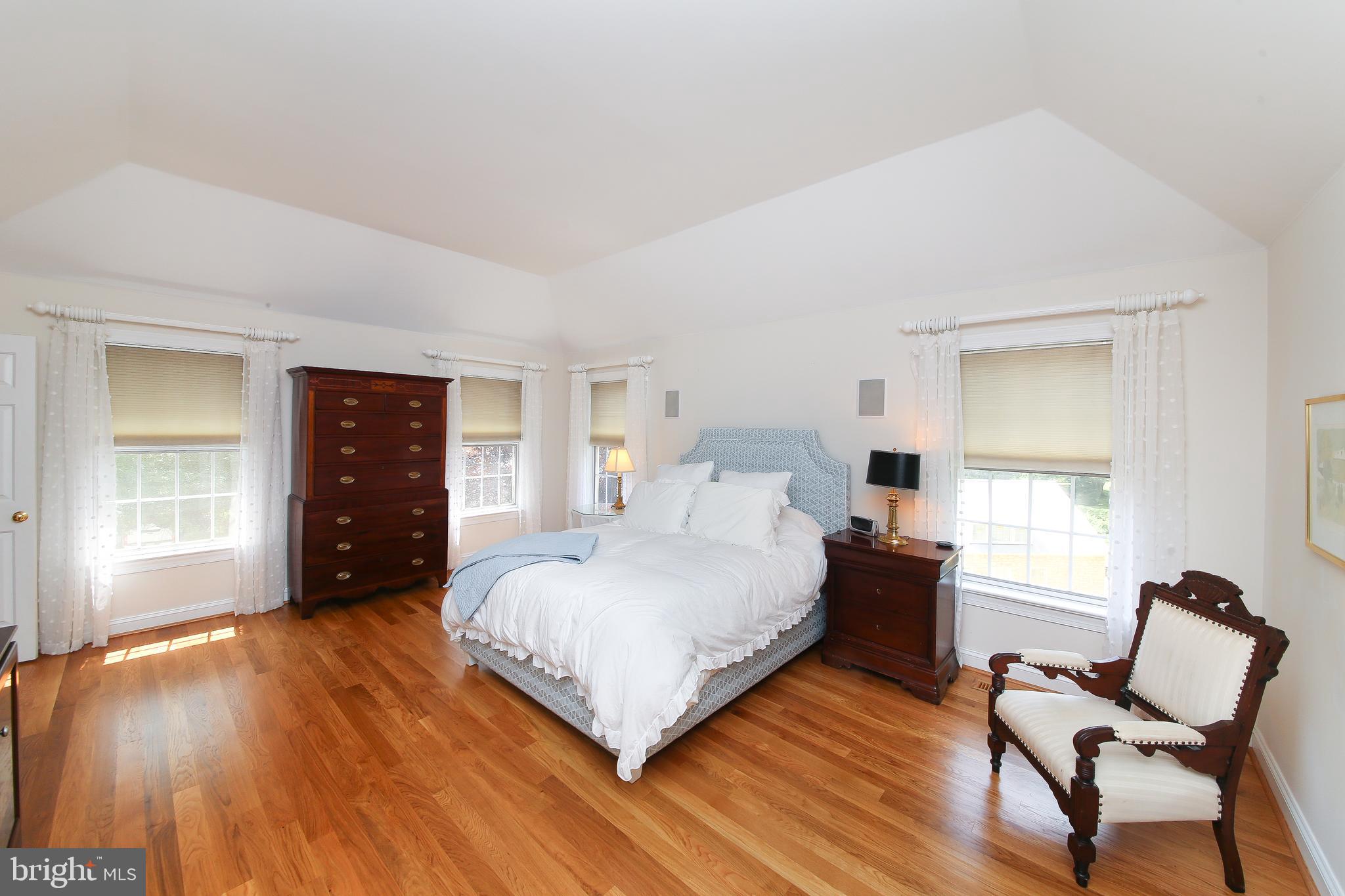 4 Paul Road Wayne, PA 19087 - Photo 23 of 46 a bedroom with a bed and chair