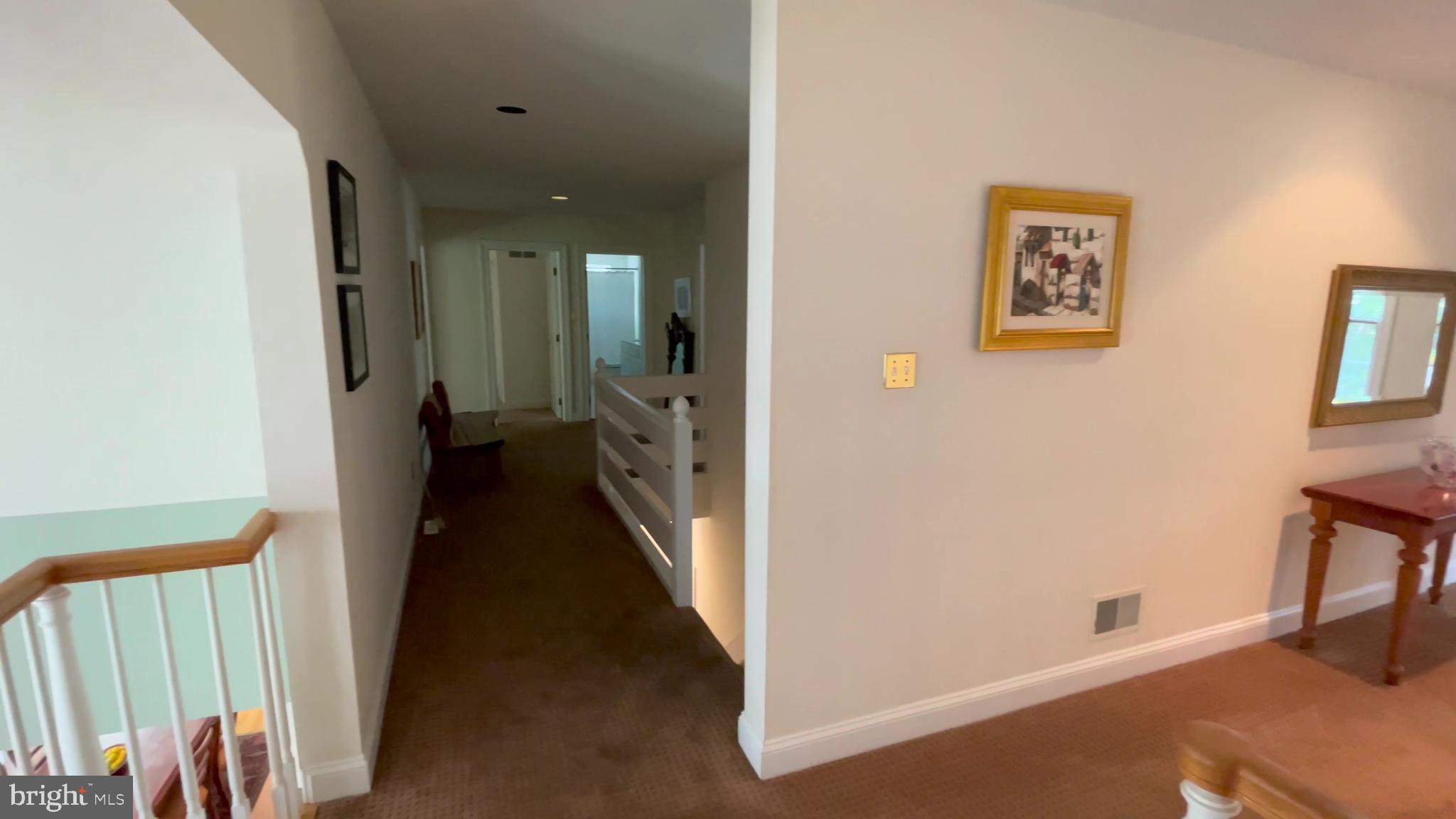 4 Paul Road Wayne, PA 19087 - Photo 34 of 46 a view of a hallway with wooden floor and staircase