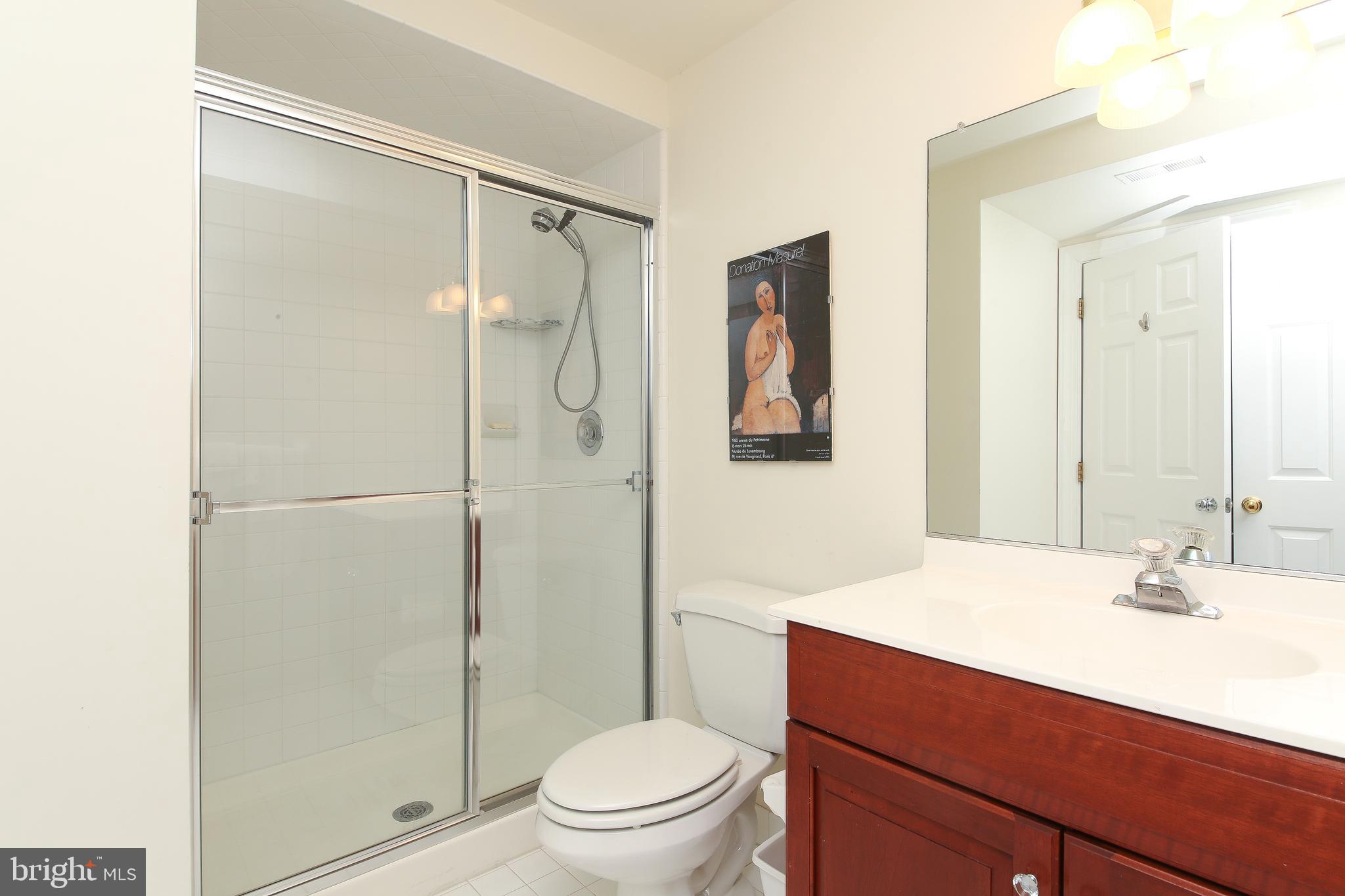 4 Paul Road Wayne, PA 19087 - Photo 40 of 46 a bathroom with a sink a toilet and shower