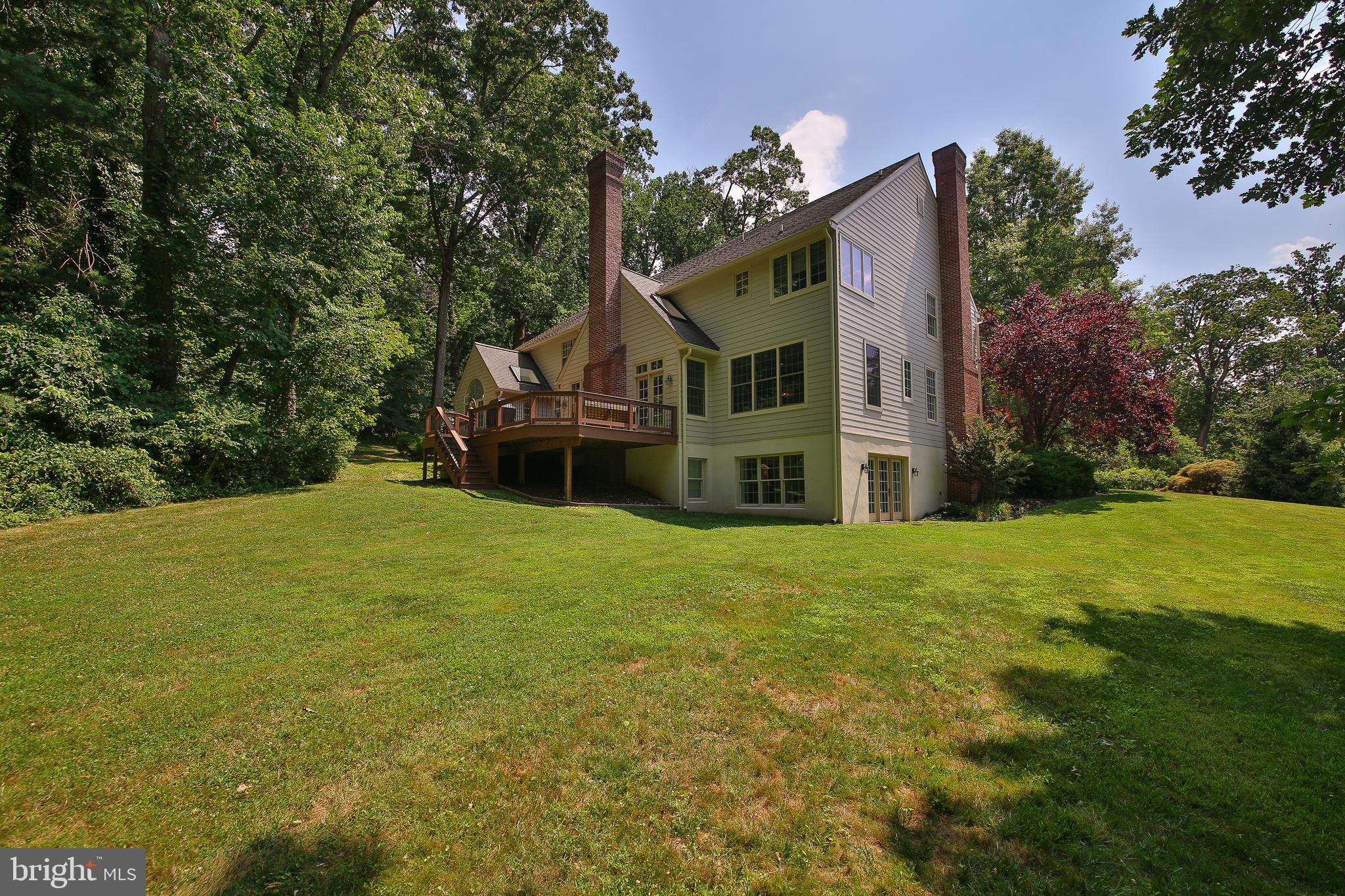 4 Paul Road Wayne, PA 19087 - Photo 45 of 46 a front view of a house with a yard