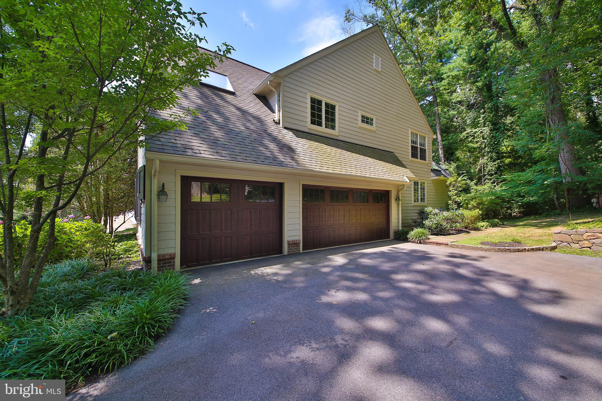 4 Paul Road Wayne, PA 19087 - Photo 46 of 46 a front view of a house with yard and trees