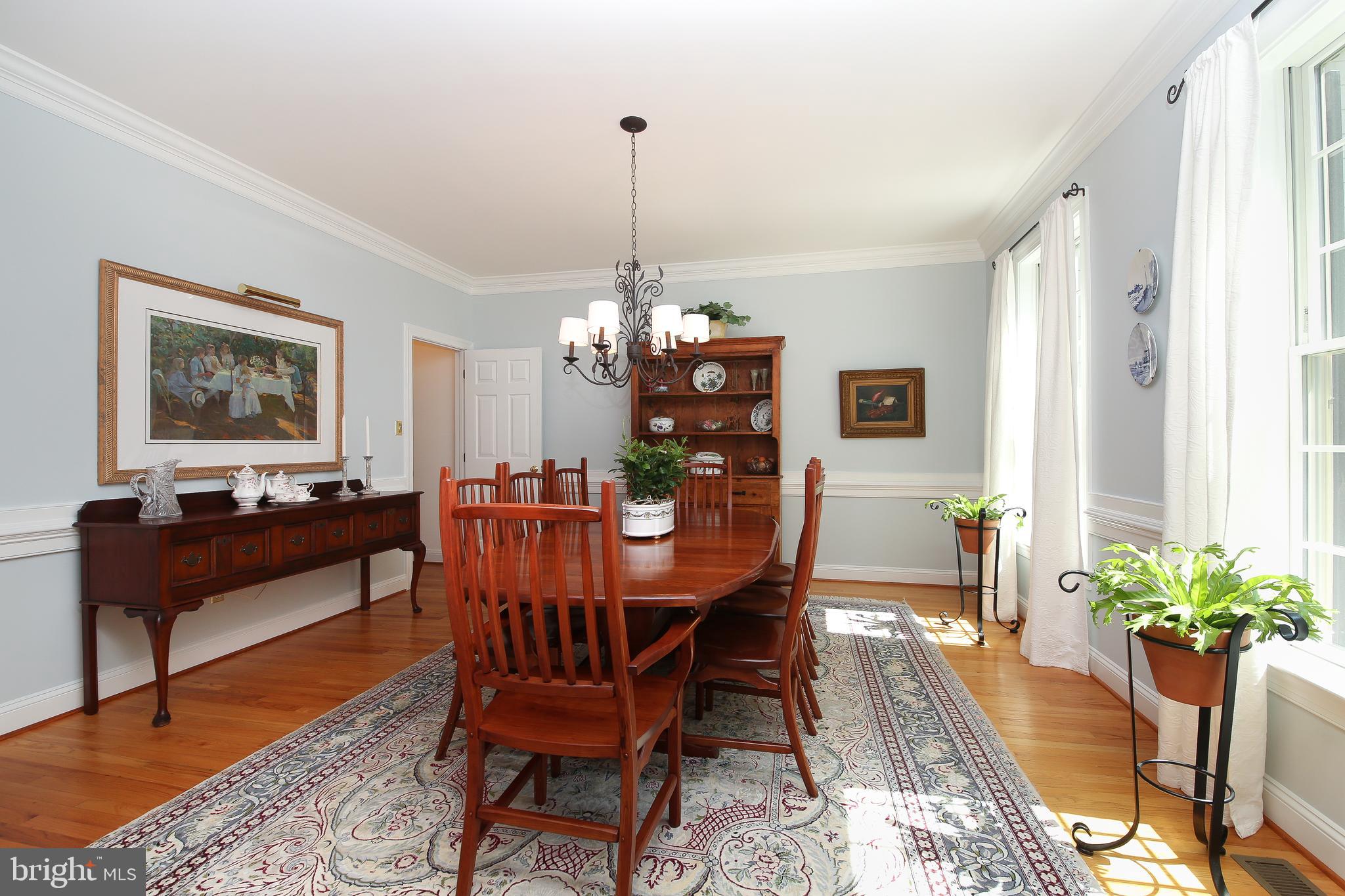 4 Paul Road Wayne, PA 19087 - Photo 9 of 46 a view of a dining room with furniture and a chandelier