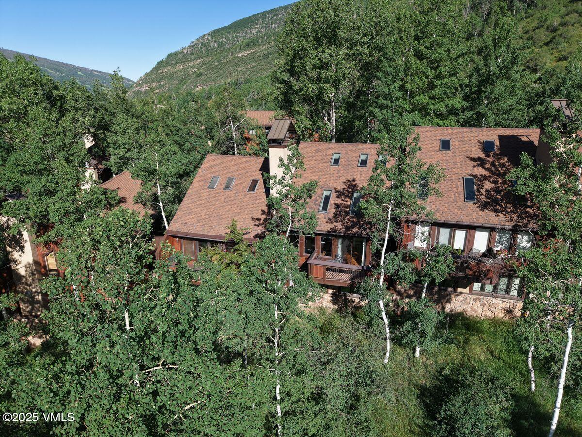 2875 Manns Ranch Road, Unit J2 Vail, CO 81657 - Photo 13 of 25 an aerial view of a house with a garden view