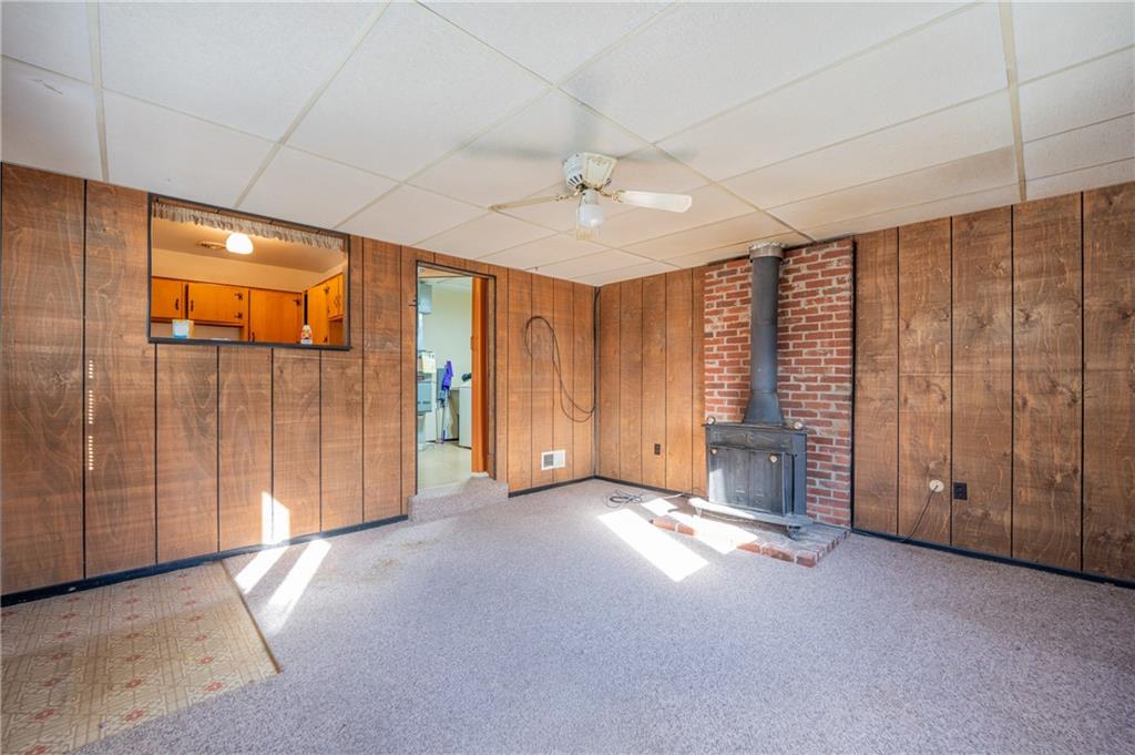 222 Ridgefield Drive Greensburg, PA 15601 - Photo 13 of 28 an empty room with sliding door and windows
