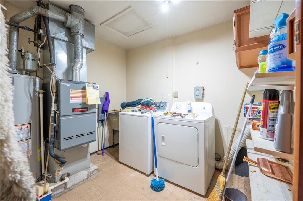 222 Ridgefield Drive Greensburg, PA 15601 - Photo 15 of 28 a storage room with washer and dryer