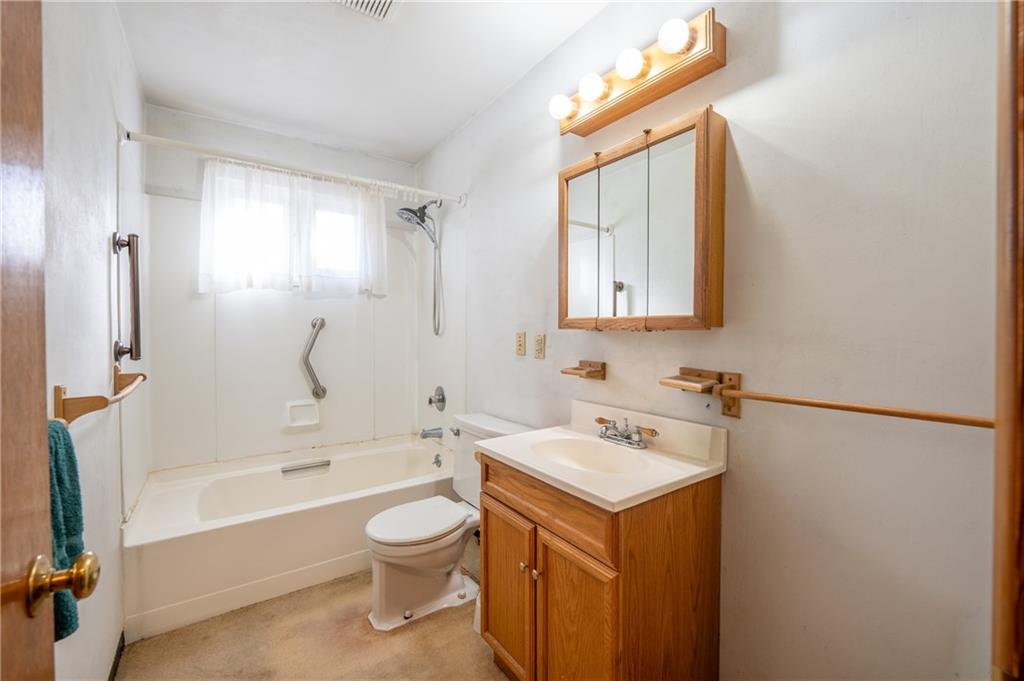 222 Ridgefield Drive Greensburg, PA 15601 - Photo 18 of 28 a bathroom with a sink a toilet and shower