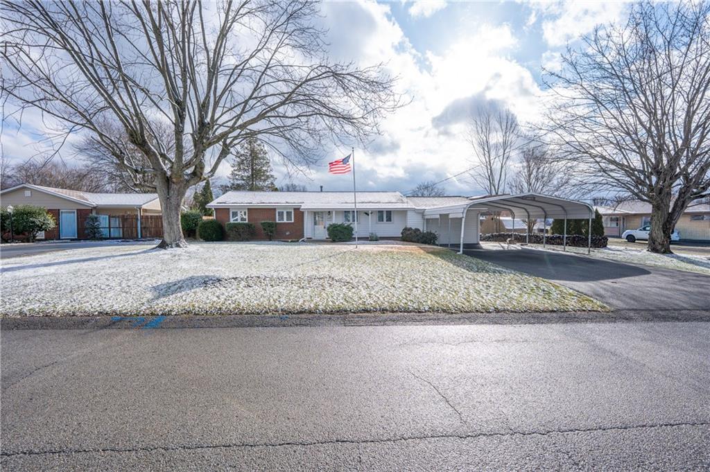 222 Ridgefield Drive Greensburg, PA 15601 - Photo 2 of 28 a view of house with a yard covered with snow