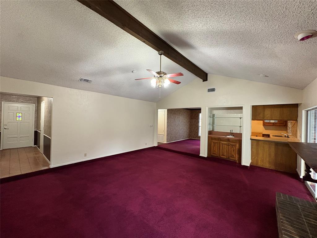 1838 West Taylor Street Sherman, TX 75092 - Photo 11 of 33 a view of an empty room with a kitchen