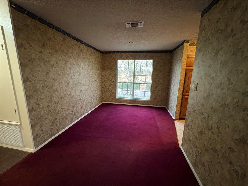 1838 West Taylor Street Sherman, TX 75092 - Photo 13 of 33 en empty room with windows