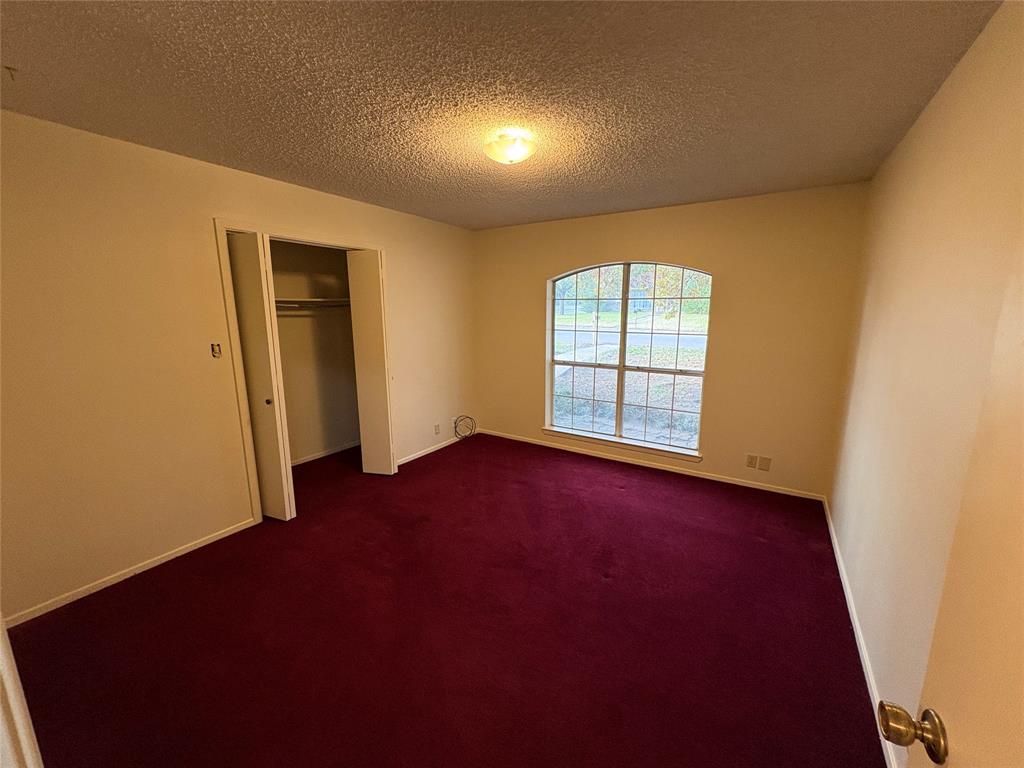 1838 West Taylor Street Sherman, TX 75092 - Photo 21 of 33 an empty room with windows