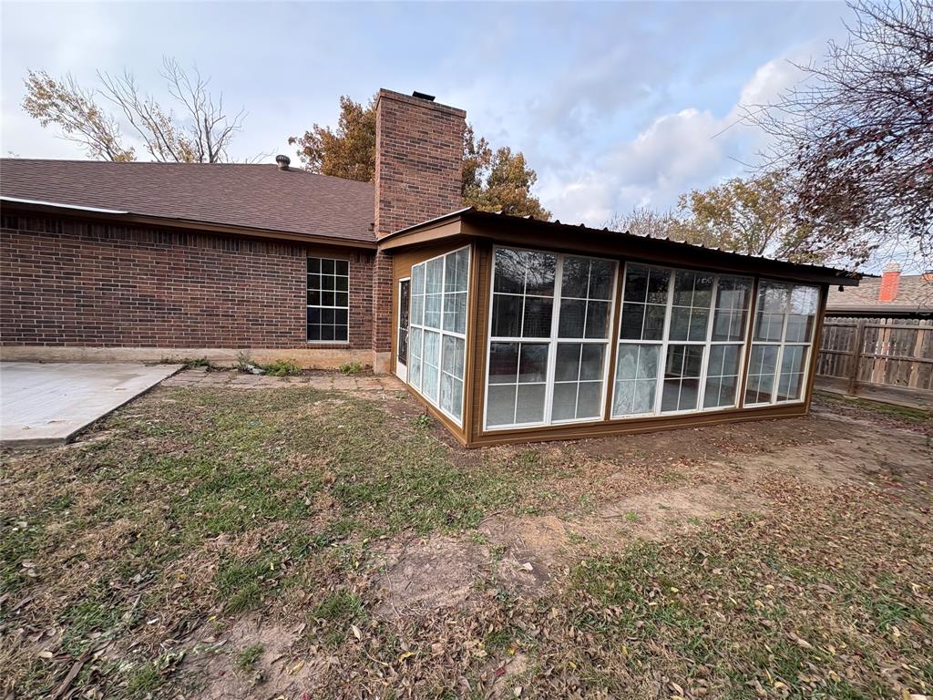 1838 West Taylor Street Sherman, TX 75092 - Photo 28 of 33 a view of a house with a yard