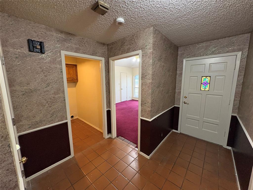 1838 West Taylor Street Sherman, TX 75092 - Photo 4 of 33 a view of room with window and wooden cabinets