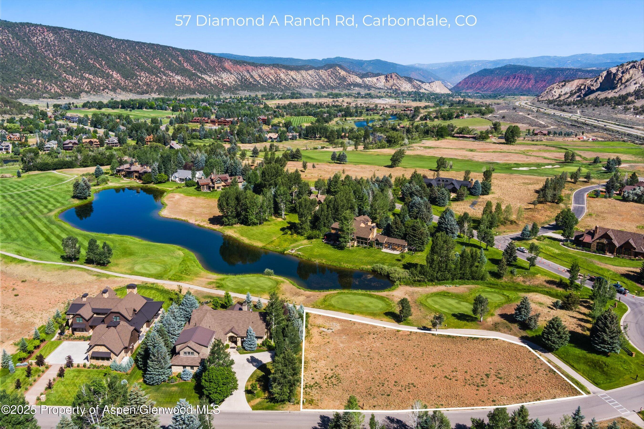 a view of a city with a lake