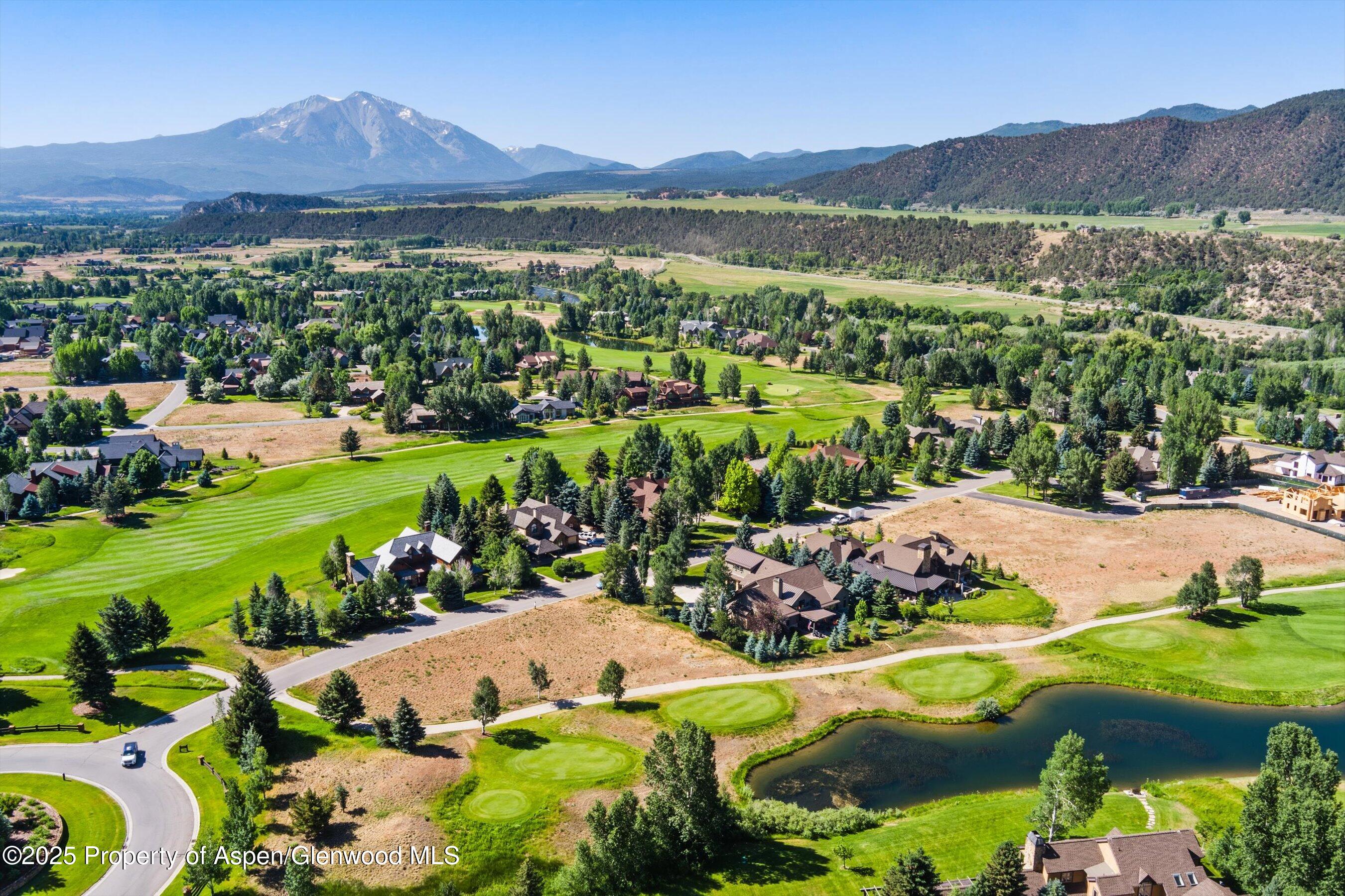 57 Diamond A Ranch Road Carbondale, CO 81623 - Photo 3 of 18 a view of a lush green hillside and houses