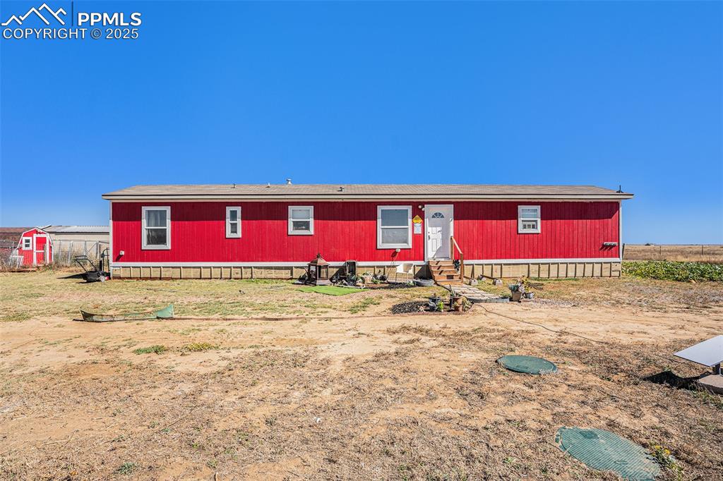 a front view of a house with yard