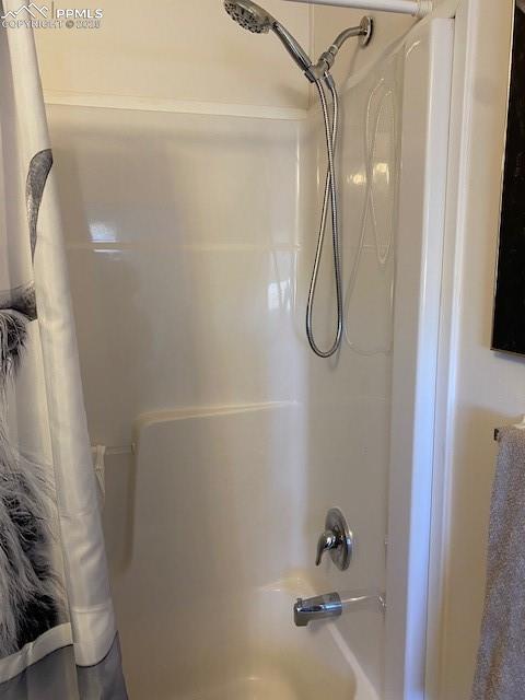 6855 Lauppe Road Yoder, CO 80864 - Photo 14 of 27 a bathroom with a shower