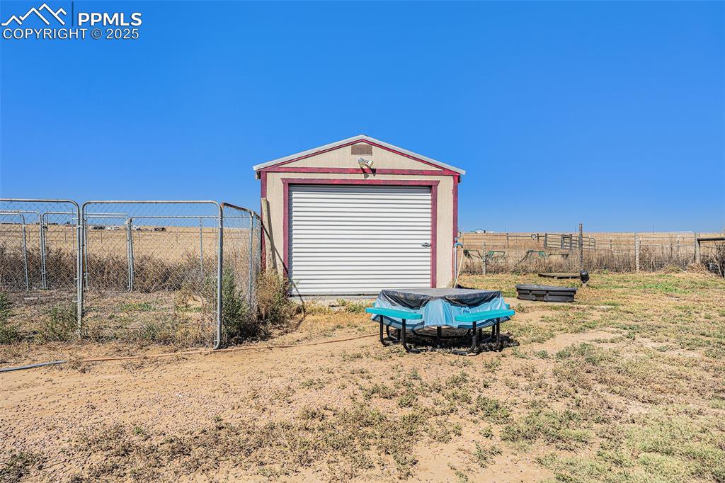 6855 Lauppe Road Yoder, CO 80864 - Photo 20 of 27 a house with a yard