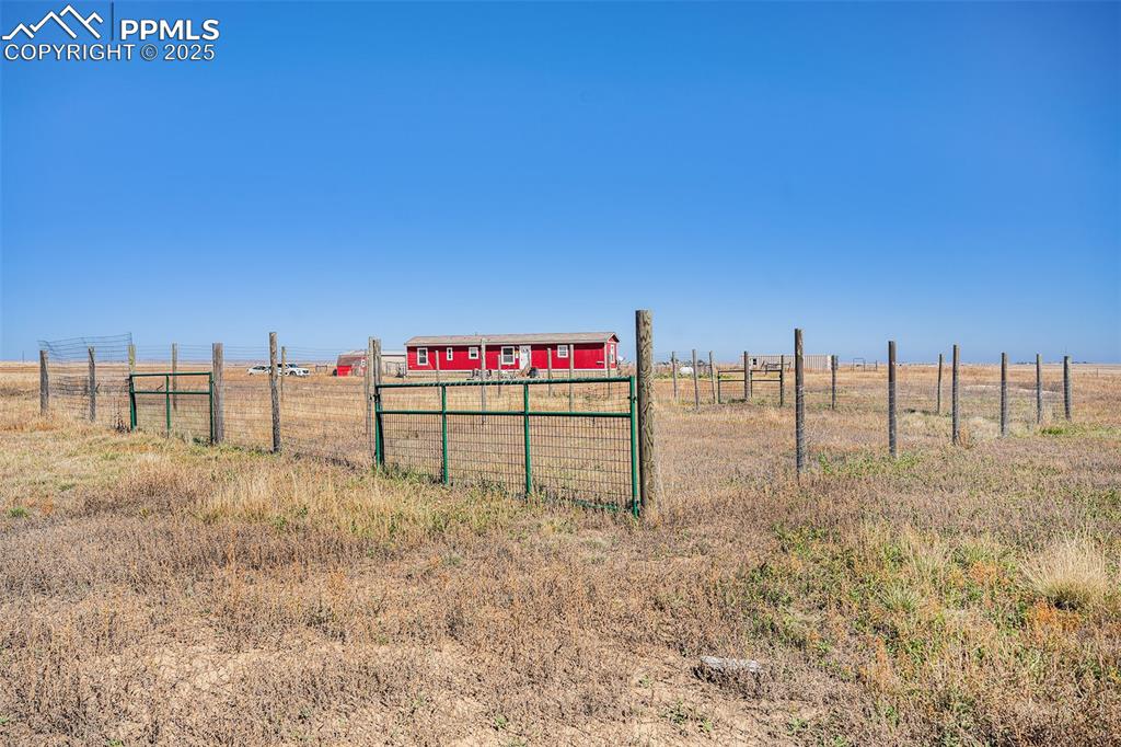 6855 Lauppe Road Yoder, CO 80864 - Photo 21 of 27 a view of a backyard