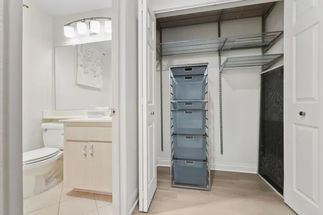 a bathroom with a shower and a toilet