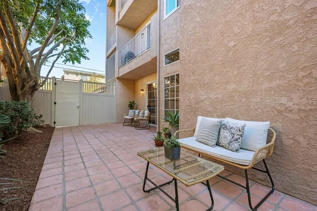 a view of a bench in the backyard