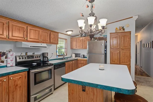 a room with pool table and windows