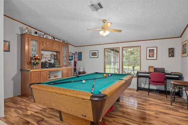 a bathroom with a sink a mirror and a bathtub