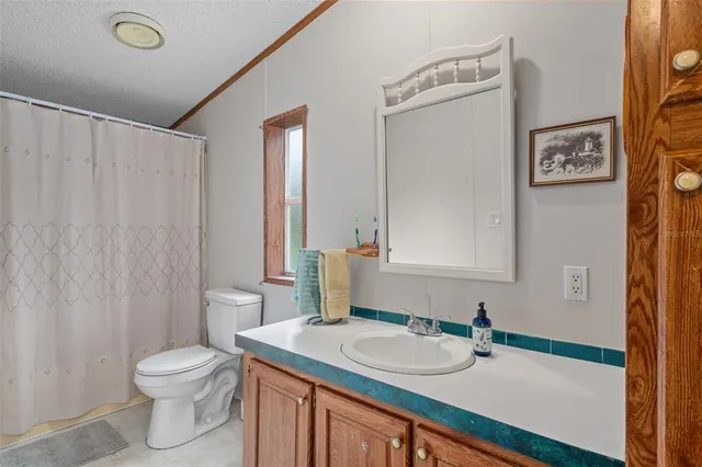 a view of a golf course with a lake