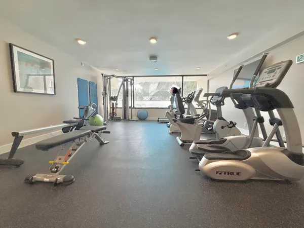 a view of a room with gym equipment
