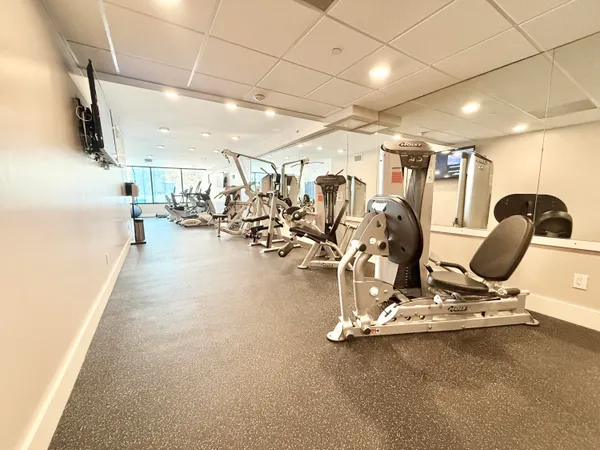 a view of parking garage with cars