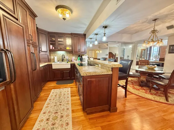 a very nice looking kitchen with a large window