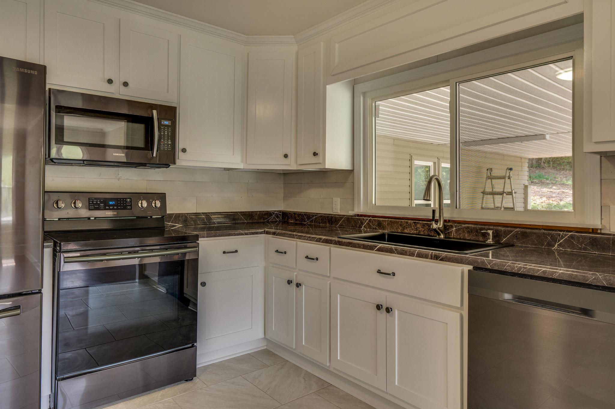 2720 Toll Gate Road Petersburg, TN 37144 - Photo 5 of 22 NEW appliances, counter tops, extra large sink and cabinets!