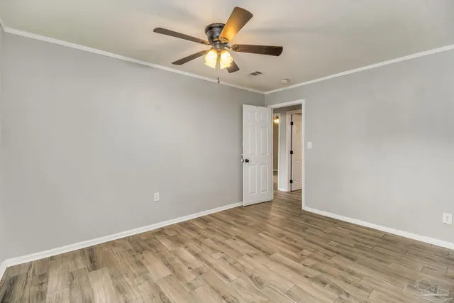 a view of a hallway with washer and dryer