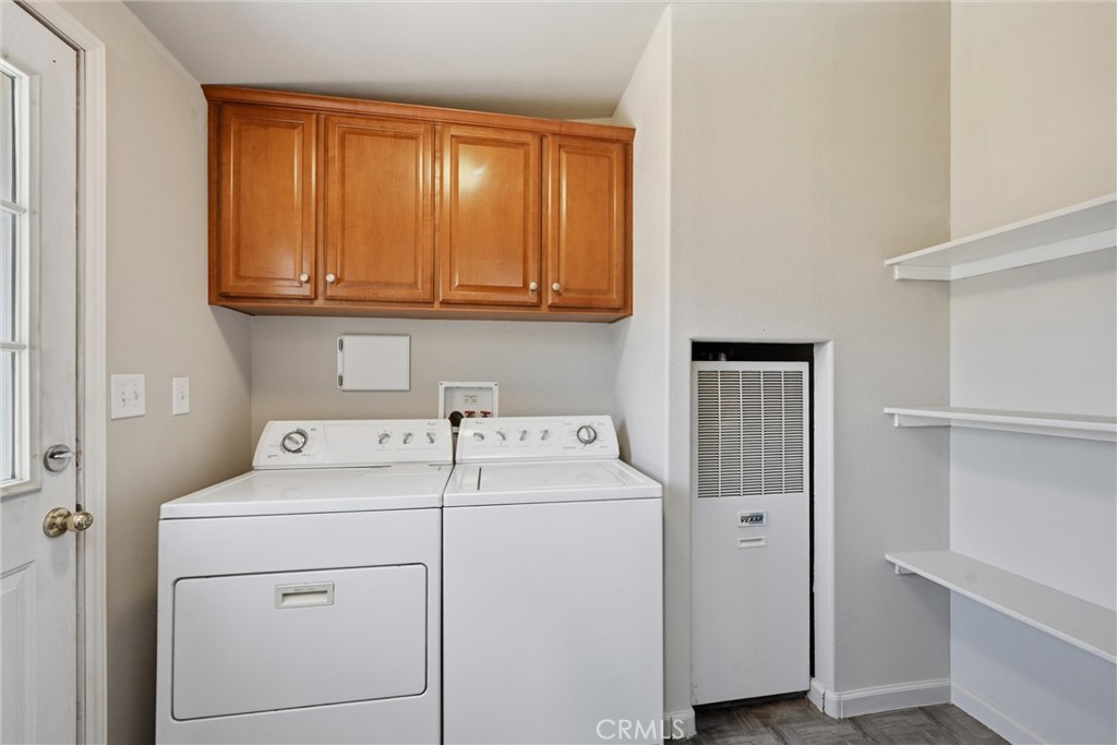 2860 Spring Valley Road Clearlake Oaks, CA 95423 - Photo 19 of 38 a utility room with dryer and washer