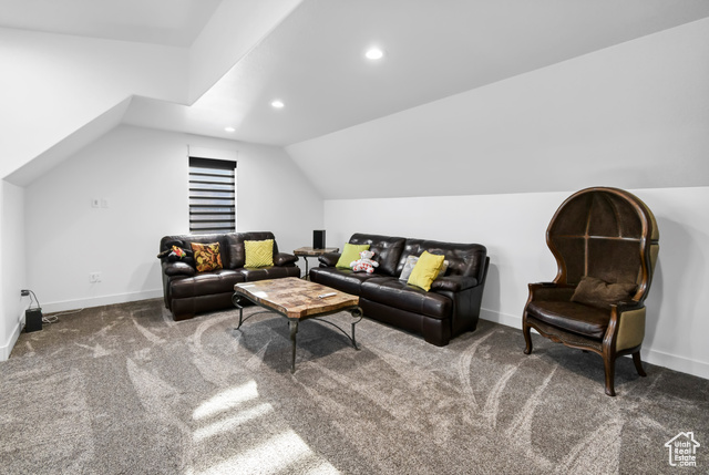 1952 Highway 118 Monroe, UT 84754 - Photo 53 of 88 Living area featuring vaulted ceiling, carpet floors, and recessed lighting