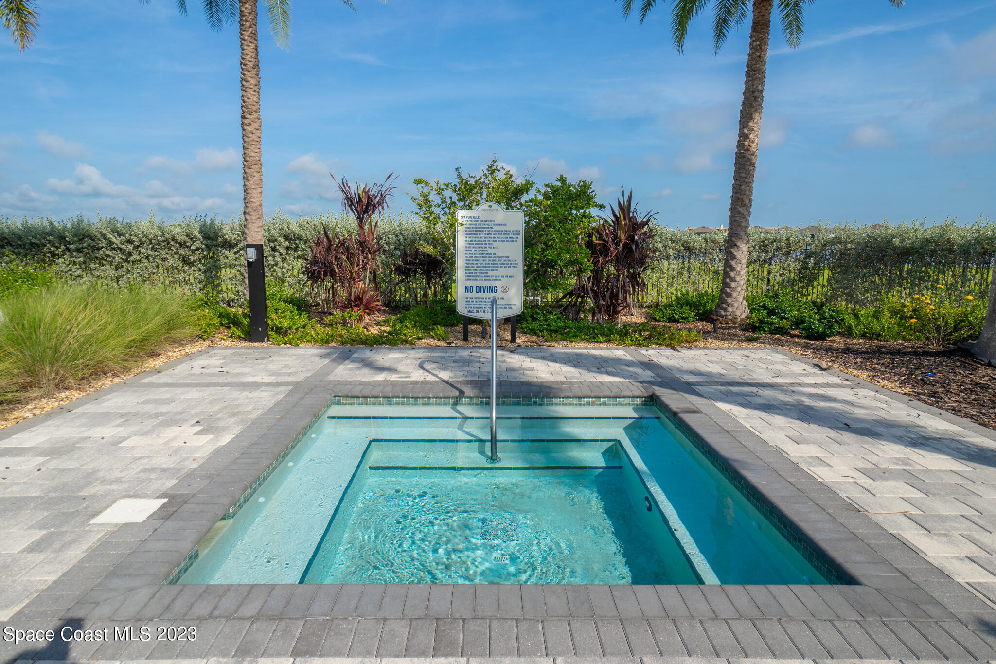 9753 Alister Drive Melbourne, FL 32940 - Photo 26 of 42 a park with lots of tall buildings