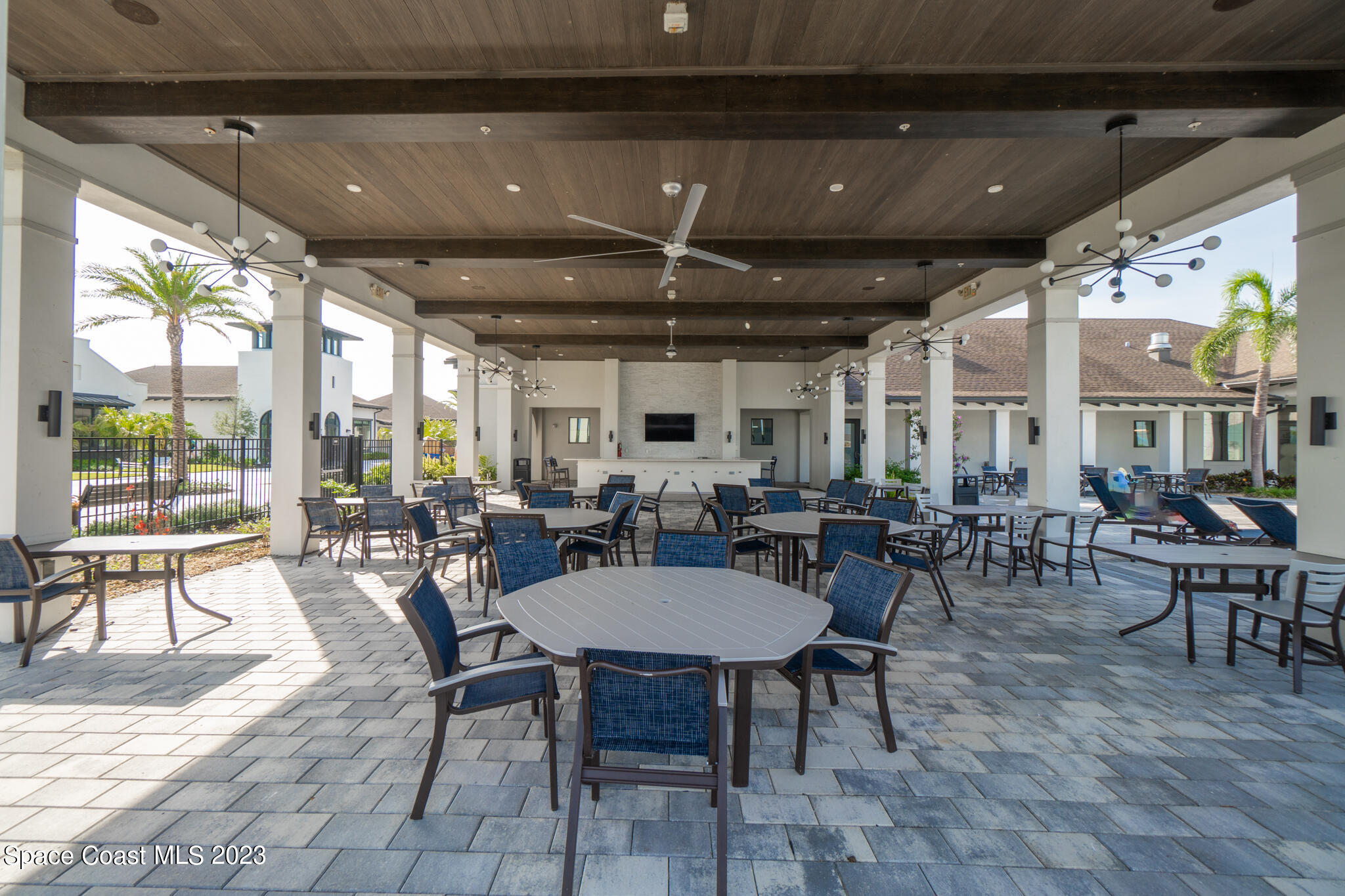 9753 Alister Drive Melbourne, FL 32940 - Photo 35 of 42 a view of a dining room with furniture window and outside view